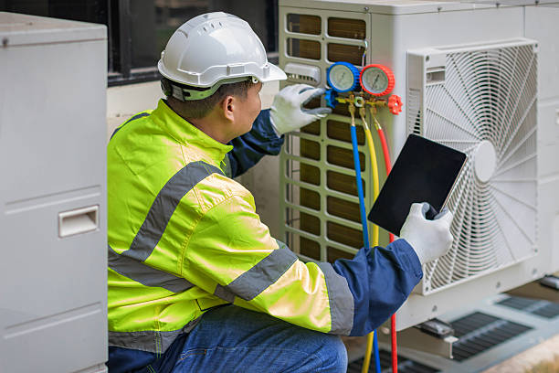 Professional Heat Pump Repair technician working in Reeseville, WI